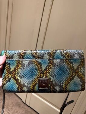 Dooney & Bourke leather snake print small shoulder bag.  Excellent condition!